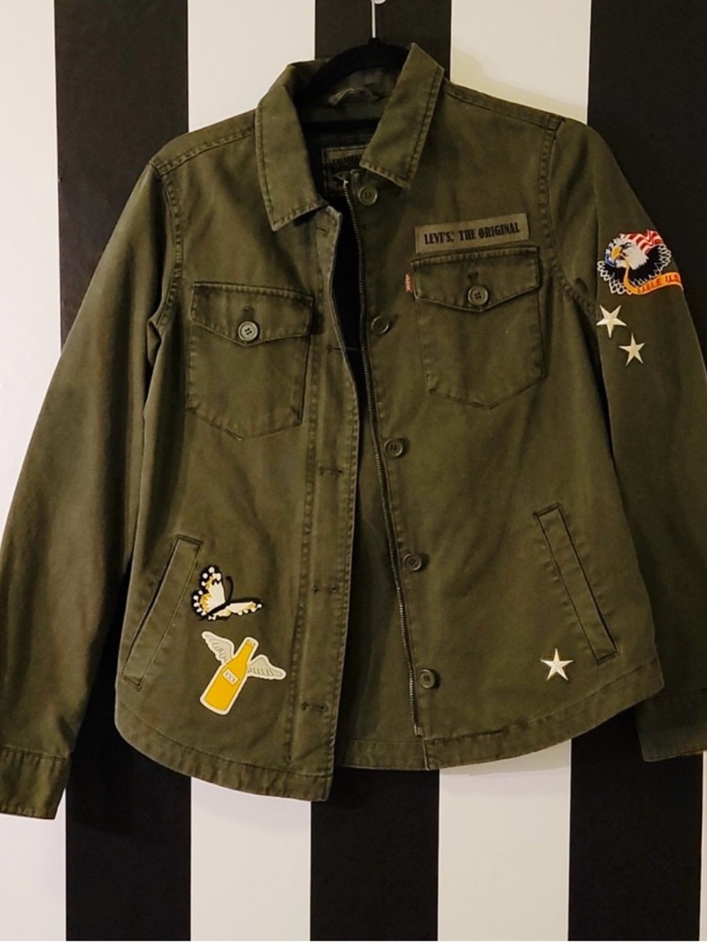 Levi's woman olive green jean army -style jacket. Button-front, size XS